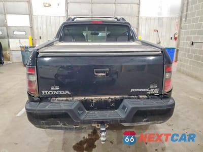 Zdjęcie 6 z 12 samochodu: 2013 HONDA RIDGELINE SPORT VIN:5FPYK1F75DB009945 - miniatura