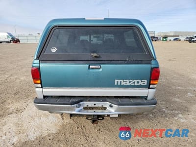 Zdjęcie 6 z 12 samochodu: 1994 MAZDA B4000 CAB PLUS VIN:4F4DR17X7RTM50828 - miniatura