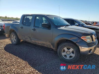 Czwarte zdjęcie samochodu z boku: 2005 NISS FRONTIER SE DESERT RUNNER VIN:1N6AD07WX5C427434 - miniatura