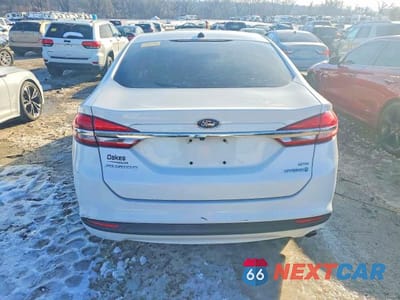 Zdjęcie 6 z 12 samochodu: 2018 FORD FUSION SE HYBRID VIN:3FA6P0LU2JR116263 - miniatura