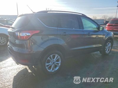 Trzecie zdjęcie samochodu z tyłu: 2018 FORD ESCAPE SE VIN:1FMCU0GD6JUB61758 - miniatura