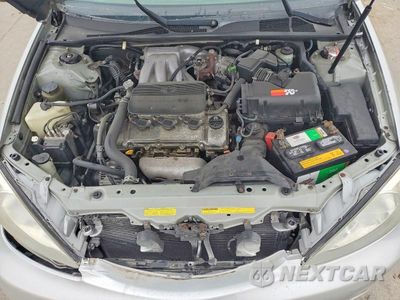 Zdjęcie 11 z 12 samochodu: 2003 TOYOTA CAMRY LE VIN:4T1BF30K63U037976 - miniatura
