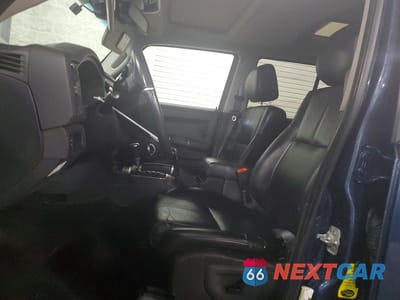 Zdjęcie 7 z 13 samochodu: 2009 JEEP COMMANDER LIMITED VIN:1J8HG58P19C501299 - miniatura