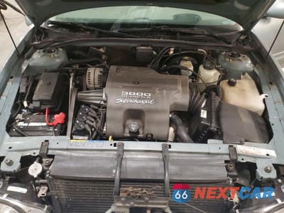 Zdjęcie 11 z 13 samochodu: 2003 BUICK PARK AVENUE ULTRA VIN:1G4CU541334204138 - miniatura