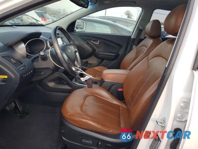 Zdjęcie 7 z 12 samochodu: 2014 HYUNDAI TUCSON GLS VIN:KM8JUCAG7EU832257 - miniatura