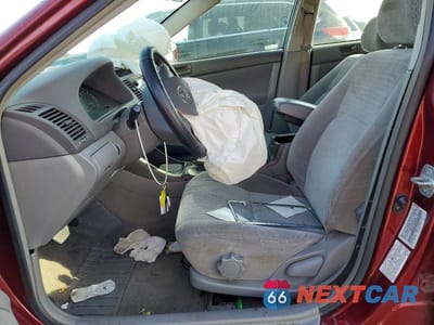 Zdjęcie 7 z 12 samochodu: 2002 TOYOTA CAMRY LE VIN:JTDBE32K720093483 - miniatura