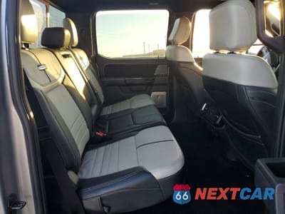 Zdjęcie 10 z 14 samochodu: 2024 FORD F150 LIGHTNING PLATINUM VIN:1FT6W7L70RWG01977 - miniatura