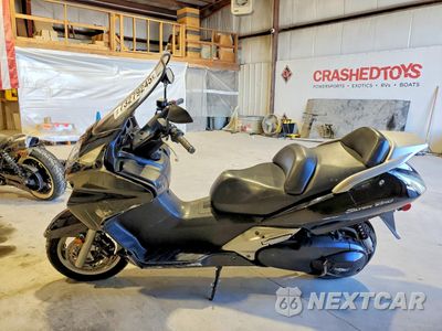 Trzecie zdjęcie samochodu z tyłu: 2013 HONDA FSC600 A VIN:JH2PF0147DK100239 - miniatura