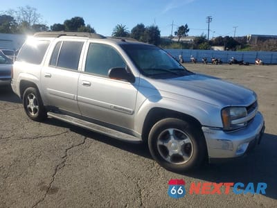 Czwarte zdjęcie samochodu z boku: 2004 CHEVROLET TRAILBLAZER EXT LS VIN:1GNET16S646219471 - miniatura