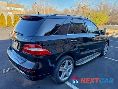 Trzecie zdjęcie samochodu z tyłu: 2014 MERCEDES-BENZ ML 550 4MATIC VIN:4JGDA7DB5EA341748 - miniatura
