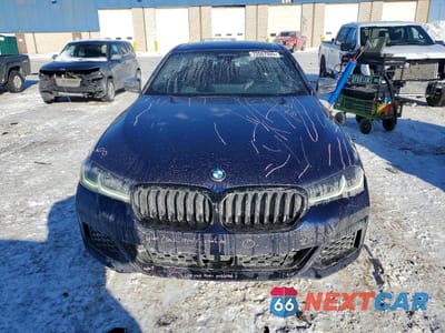 Piąte zdjęcie samochodu w środku: 2022 BMW M550XI VIN:WBA13BK07NCK97744 - miniatura