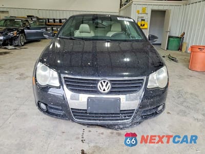 Piąte zdjęcie samochodu w środku: 2011 VOLKSWAGEN EOS KOMFORT VIN:WVWBW7AH3BV002898 - miniatura