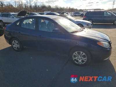 Czwarte zdjęcie samochodu z boku: 2010 HYUNDAI ELANTRA VIN:KMHDU4AD6AU868928 - miniatura