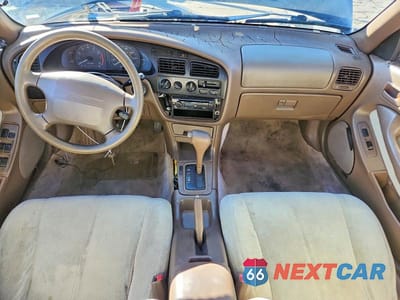 Zdjęcie 8 z 12 samochodu: 1994 TOYOTA CAMRY LE VIN:4T1SK12E7RU331032 - miniatura