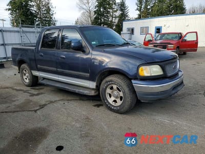 Czwarte zdjęcie samochodu z boku: 2001 FORD F150 SUPERCREW VIN:1FTRW07LX1KC32150 - miniatura