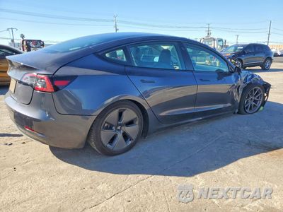 Trzecie zdjęcie samochodu z tyłu: 2023 TESLA MODEL 3 VIN:5YJ3E1EA6PF711980 - miniatura