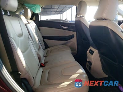 Zdjęcie 11 z 12 samochodu: 2021 FORD EDGE TITANIUM VIN:2FMPK4K93MBA18116 - miniatura