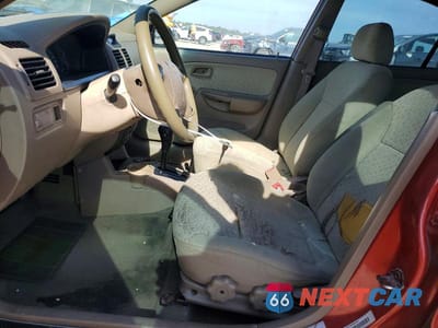 Zdjęcie 7 z 12 samochodu: 2003 KIA RIO VIN:KNADC125236242813 - miniatura