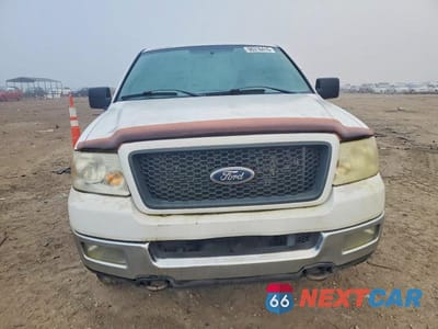 Piąte zdjęcie samochodu w środku: 2004 FORD F150 VIN:1FTVX14524NA56866 - miniatura