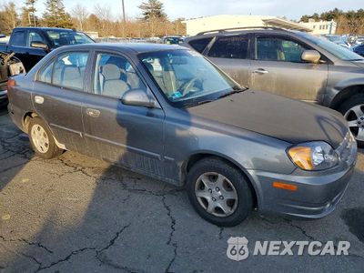 Czwarte zdjęcie samochodu z boku: 2004 HYUNDAI ACCENT GL VIN:KMHCG45C14U513691 - miniatura