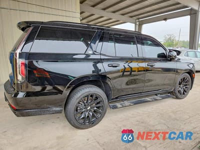 Trzecie zdjęcie samochodu z tyłu: 2023 CADILLAC ESCALADE SPORT PLATINUM VIN:1GYS4GKL0PR277759 - miniatura
