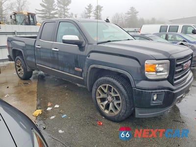 Czwarte zdjęcie samochodu z boku: 2015 GMC SIERRA K1500 SLE VIN:1GTV2UEC0FZ191062 - miniatura