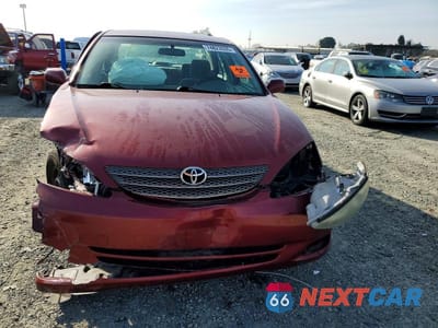 Piąte zdjęcie samochodu w środku: 2002 TOYOTA CAMRY LE VIN:JTDBE32K720093483 - miniatura