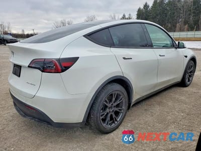 Trzecie zdjęcie samochodu z tyłu: 2024 TESLA MODEL Y VIN:7SAYGAEE4RF166130 - miniatura