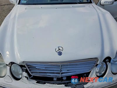 Zdjęcie 11 z 13 samochodu: 2004 MERCEDES-BENZ E 500 VIN:WDBUF70J24A415708 - miniatura