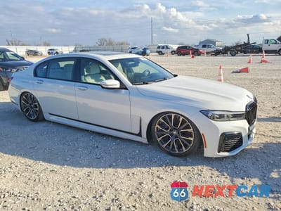 Czwarte zdjęcie samochodu z boku: 2021 BMW 740 I VIN:WBA7T2C07MCF88819 - miniatura