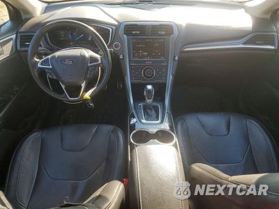 Zdjęcie 8 z 12 samochodu: 2014 FORD FUSION TITANIUM HEV VIN:3FA6P0RU3ER285494 - miniatura