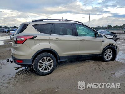 Trzecie zdjęcie samochodu z tyłu: 2017 FORD ESCAPE SE VIN:1FMCU9G92HUB24376 - miniatura