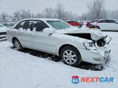 Czwarte zdjęcie samochodu z boku: 2003 TOYOTA AVALON XL VIN:4T1BF28B93U334593 - miniatura