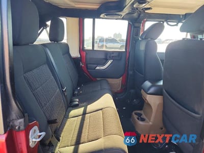Zdjęcie 10 z 12 samochodu: 2012 JEEP WRANGLER UNLIMITED SAHARA VIN:1C4BJWEGXCL173008 - miniatura