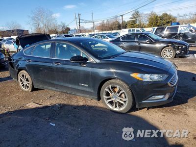 Czwarte zdjęcie samochodu z boku: 2017 FORD FUSION SE HYBRID VIN:3FA6P0LU3HR381817 - miniatura