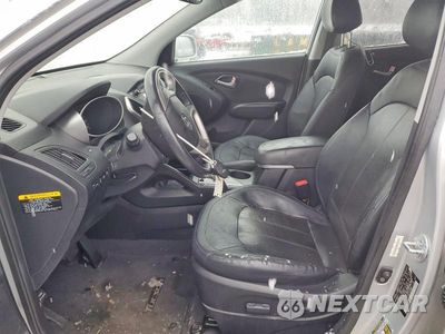 Zdjęcie 7 z 12 samochodu: 2013 HYUNDAI TUCSON GLS VIN:KM8JUCAC1DU724440 - miniatura