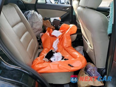 Zdjęcie 11 z 12 samochodu: 2014 MAZDA CX-5 GT VIN:JM3KE4DY0E0382272 - miniatura