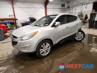 2010 HYUNDAI TUCSON KM8JUCAC8AU047186 - główne zdjęcie licytacji z USA - miniatura