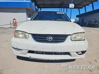 Piąte zdjęcie samochodu w środku: 2001 TOYOTA COROLLA CE VIN:1NXBR12E61Z458631 - miniatura