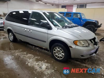 Czwarte zdjęcie samochodu z boku: 2002 DODGE GRAND CARAVAN SPORT VIN:1B4GP44R12B554033 - miniatura