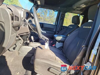 Zdjęcie 7 z 11 samochodu: 2015 JEEP WRANGLER UNLIMITED SAHARA VIN:1C4BJWEG3FL689912 - miniatura