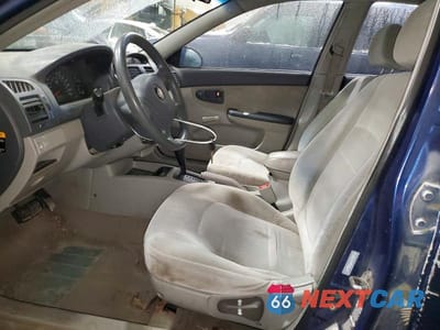 Zdjęcie 7 z 11 samochodu: 2004 KIA SPECTRA LX VIN:KNAFE121145046501 - miniatura