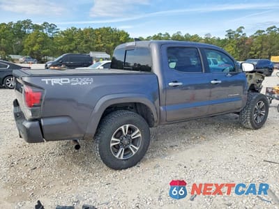 Trzecie zdjęcie samochodu z tyłu: 2018 TOYOTA TACOMA TRD SPORT VIN:5TFCZ5AN8JX144687 - miniatura