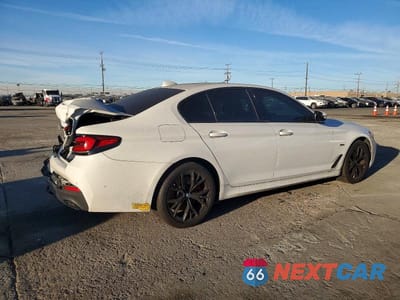 Trzecie zdjęcie samochodu z tyłu: 2022 BMW 530E VIN:WBA13AG01NCJ51181 - miniatura