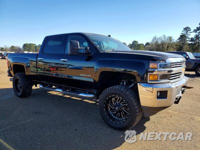 Czwarte zdjęcie samochodu z boku: 2015 CHEVROLET SILVERADO C2500 HEAVY DUTY LT VIN:1GC1CVE83FF116032 - miniatura