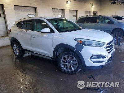 Czwarte zdjęcie samochodu z boku: 2017 HYUNDAI TUCSON SE VIN:KM8J33A41HU444728 - miniatura