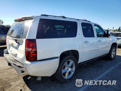 Trzecie zdjęcie samochodu z tyłu: 2013 CHEVROLET SUBURBAN K1500 LTZ VIN:1GNSKKE70DR227668 - miniatura