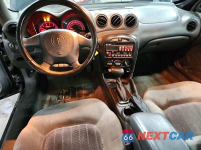Zdjęcie 8 z 13 samochodu: 2004 PONTIAC GRAND AM GT VIN:1G2NW12E74C155625 - miniatura