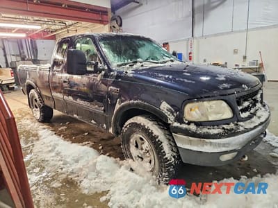 Czwarte zdjęcie samochodu z boku: 1999 FORD F150 VIN:1FTRX18LXXNB58401 - miniatura