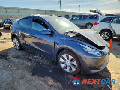 Czwarte zdjęcie samochodu z boku: 2023 TESLA MODEL Y VIN:7SAYGDEE6PA120651 - miniatura